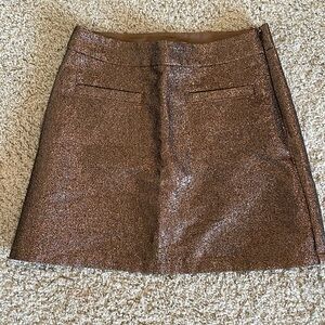 Gap gold skirt with lined shorts and side zipper.  Worn once